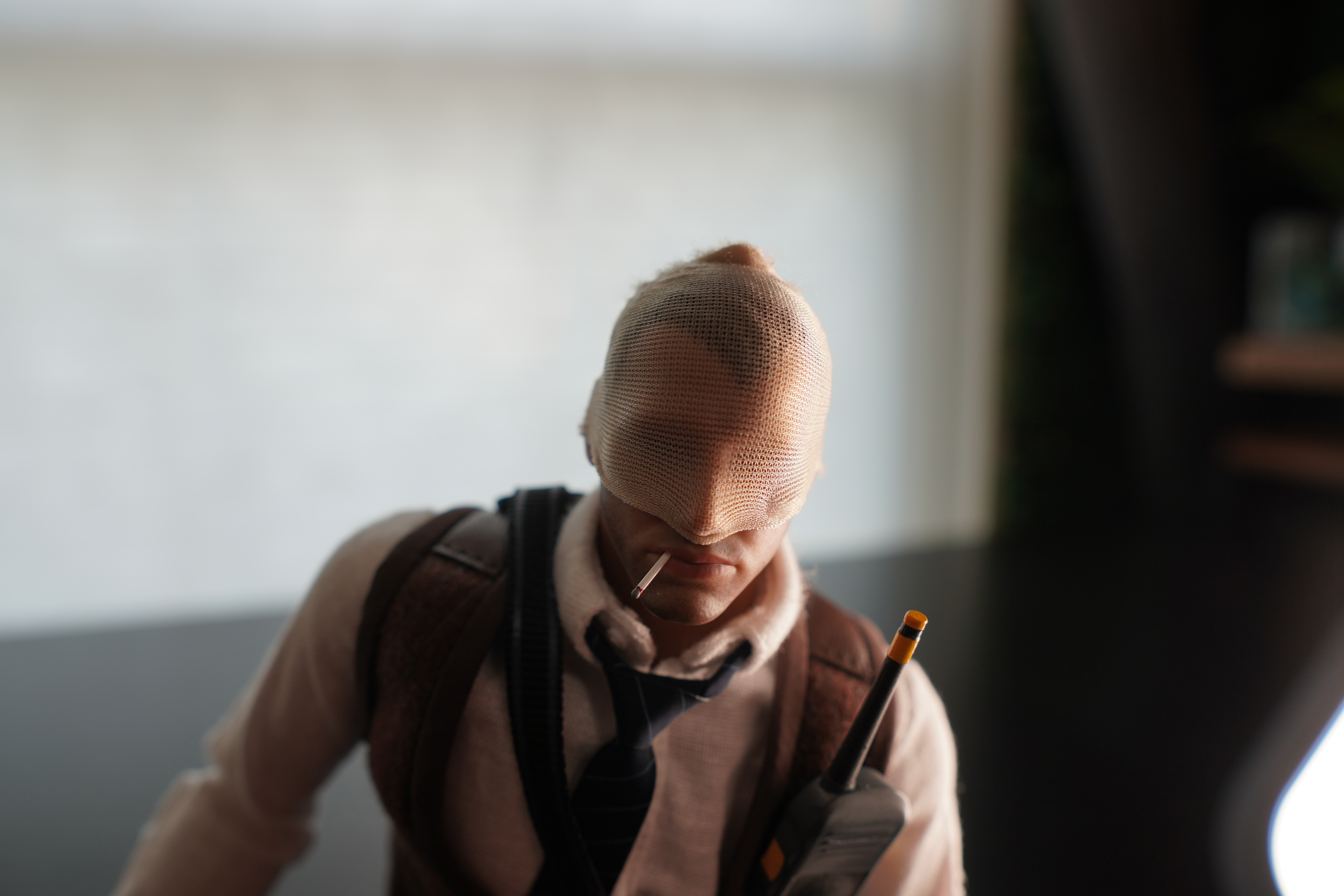 Agent number K figurine face close up v1